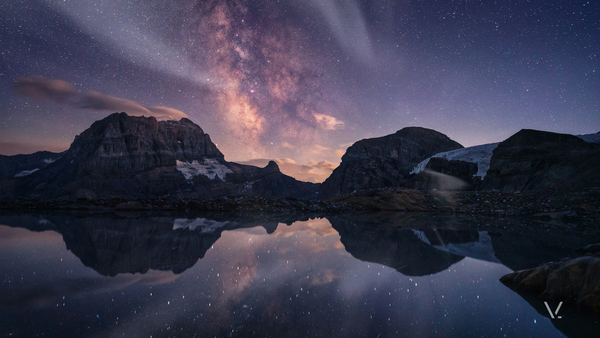 cosmos — Milky Way over an alpine lake